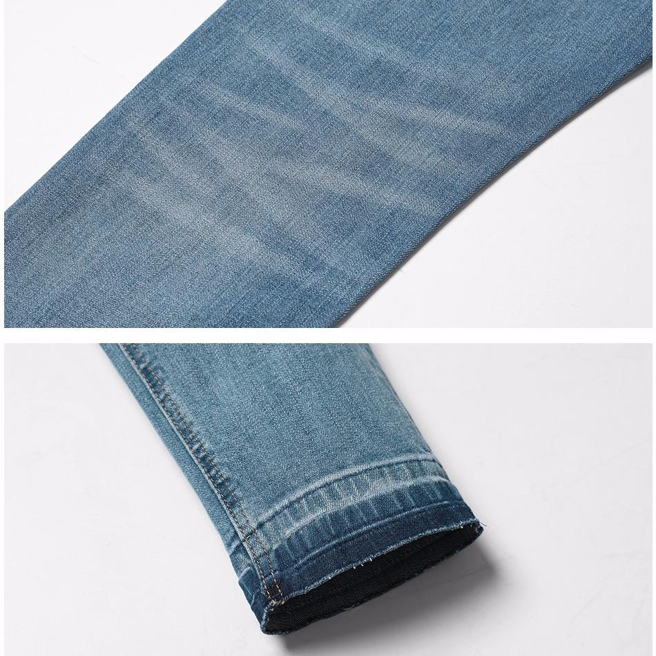 Scratched Light Blue Jeans